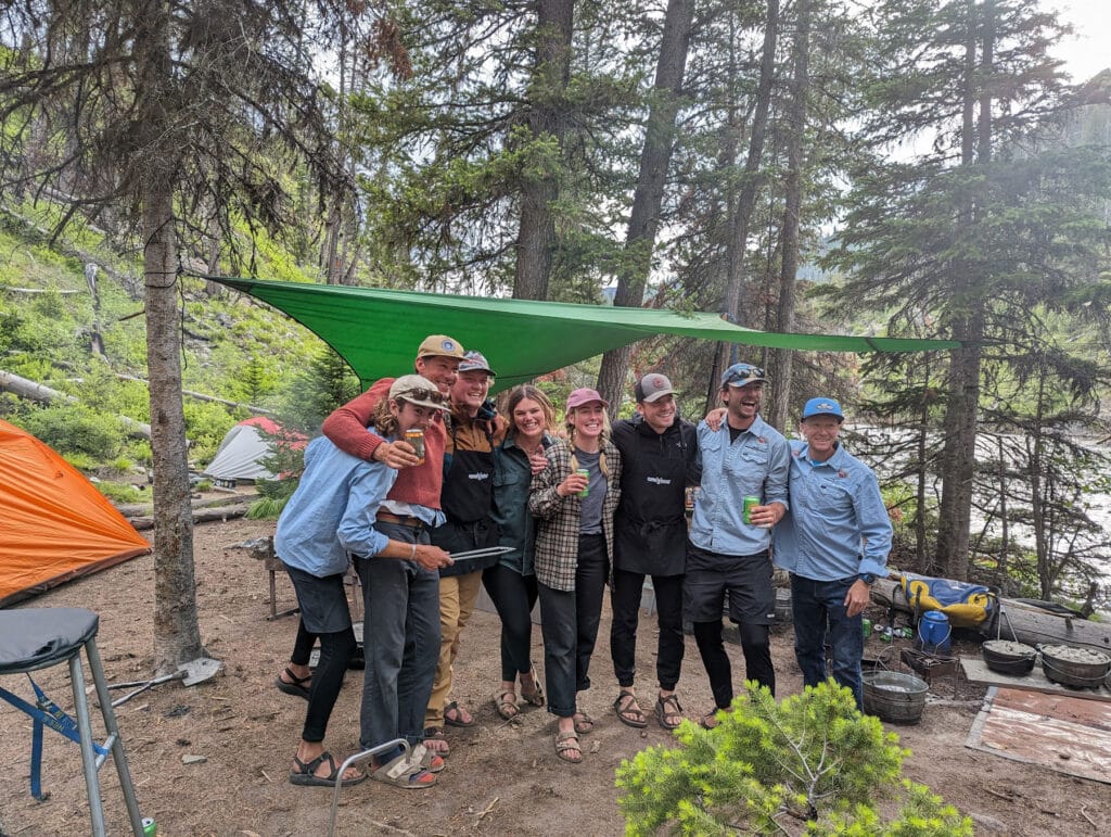 What to pack for river trip shown at Middle Fork Salmon campsite with Adventure Sun Valley crew under a shaded tarp Middle Fork rafting essentials